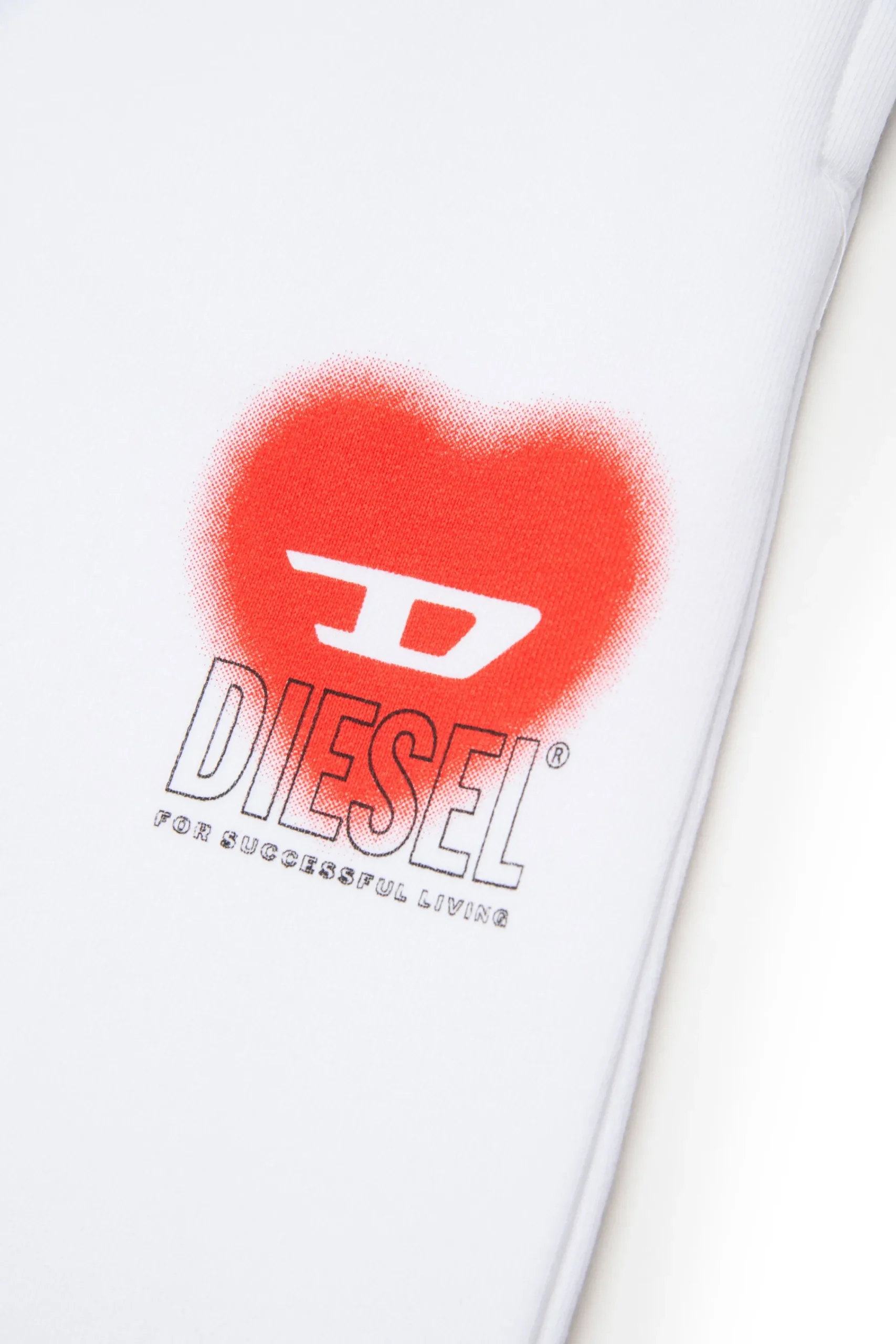 Pants>DIESEL Fleece pants with heart graphics white